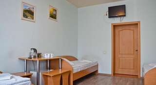Гостиница Хостел В Гости Новокузнецк Кровать в общем четырехместном номере-7